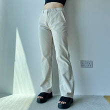 Load image into Gallery viewer, Cream flared trousers - UK 10/12
