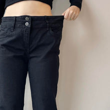 Load image into Gallery viewer, Black flared jeans - UK 14
